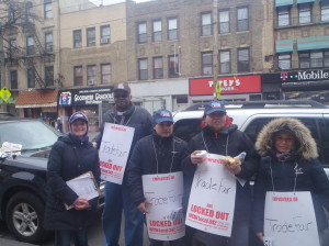 Tara Pappas of UFCW Local 342 (far left), with workers from Trade Fair meat department including Eunice Izquierdo (second from right) and Beatriz Gomez (far right)